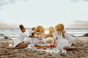 A group of women on the beach on a Bahamas bachelorette party
